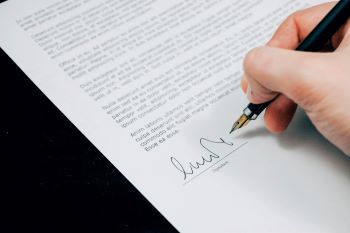 Goal Staffing Solutions signing documents for accounting services