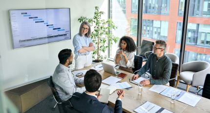Goal Staffing Solutions accounting specialists in a meeting discussing financial strategies